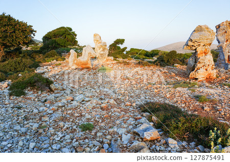Horse-shaped rock on Skyros island at sunset 127875491