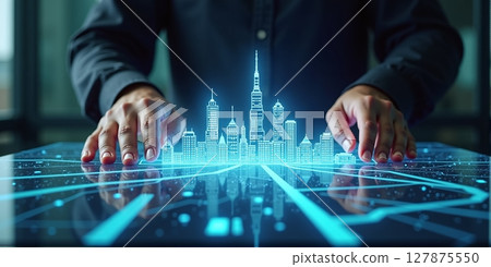 Urban planning unfolds as hands shape a glowing holographic cityscape of skyscrapers and vibrant streets Urban planning unfolds as hands shape a glowing holographic cityscape of skyscrapers and vibrant streets 127875550