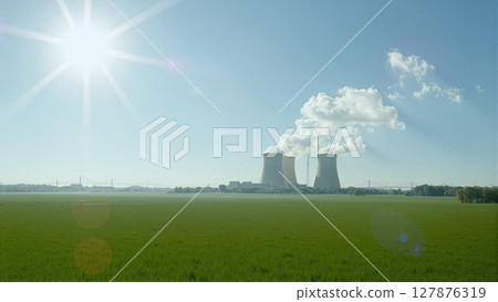 Nuclear power plant nestled in nature. Cooling towers emit steam plumes, contrasting industrial might with serene surroundings 127876319