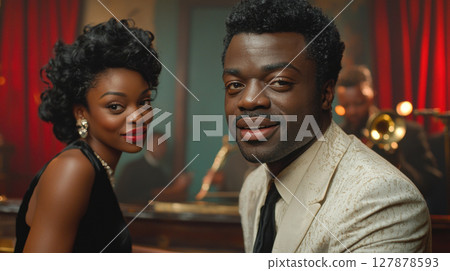 well dressed pianist in white tuxedo accompanies stunning jazz singer in black silk dress during elegant performance surrounded rich velvet curtains 127878593