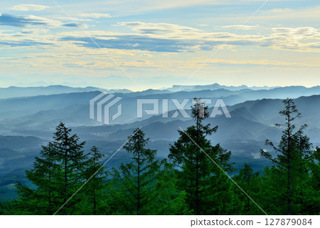 Fairy Tale Highway: A spectacular view of the Saku city and mountains in the morning mist from the pass Fairy Tale Highway: A spectacular view of the Saku city and mountains in the morning mist from the pass 127879084