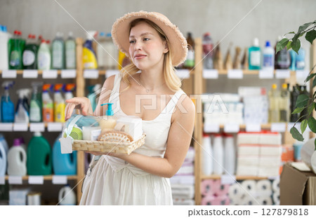 Girl shopping presents at home goods store Girl shopping presents at home goods store 127879818