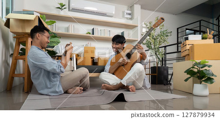 LGBT couple enjoying music and capturing moments together LGBT couple enjoying music and capturing moments together 127879934