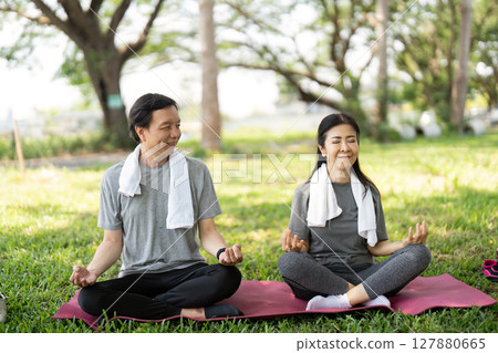 Couple Meditating Together in a Peaceful Outdoor Setting. Mindfulness Practice. 127880665
