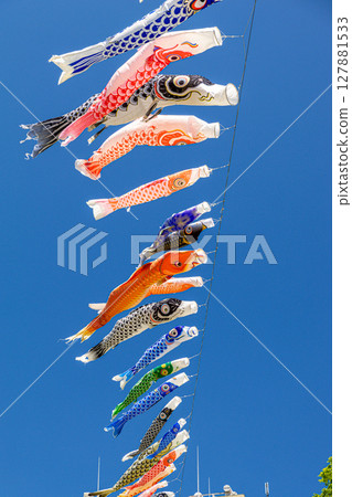 Carp streamer swimming in the blue sky 127881533