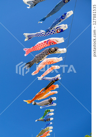 Carp streamer swimming in the blue sky 127881535