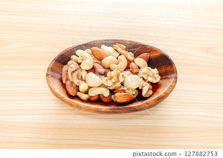 No salt added mixed nuts [wood grain background] 127882753