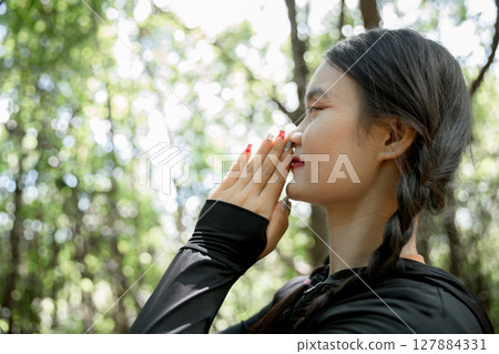 Grateful woman having HOPE praying to God. Spiritual girl smiling to sky. Happy female being thankful. Spiritual girl praying with hope. Positive asian young woman feeling hope and faith looking up. Grateful woman having HOPE praying to God. Spiritual girl smiling to sky. Happy female being thankful. Spiritual girl praying with hope. Positive asian young woman feeling hope and faith looking up. 127884331