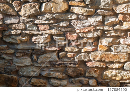 Backgrounds of the old stone wall. 127884390