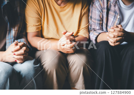 Close up group christians hands pray to God with spiritual faith on holy bible in catholic church. religion worship prayer ask god bless grace jesus believe. Christianity religion prayer holy worship Close up group christians hands pray to God with spiritual faith on holy bible in catholic church. religion worship prayer ask god bless grace jesus believe. Christianity religion prayer holy worship 127884900