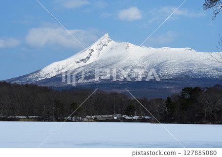 Snow-covered Mt. Komagatake and Lake Onuma Snow-covered Mt. Komagatake and Lake Onuma 127885080