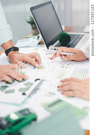 Business people working on sustainable innovation project. renewable energy concept. Teamwork Meeting, partner on model building company office technology, based green businesses and global warming. Business people working on sustainable innovation project. renewable energy concept. Teamwork Meeting, partner on model building company office technology, based green businesses and global warming. 127885183