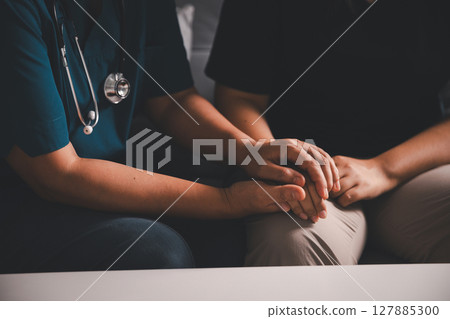 Hand and deep empathy, doctor offers medicine, support and hope to every patient, building trust through compassionate health care in clinic, hospital setting true care and medicals restore health. 127885300