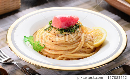 Luxurious cod roe pasta and colorful mentaiko presentation - Japanese and Western cuisine, stylish lunch Luxurious cod roe pasta and colorful mentaiko presentation - Japanese and Western cuisine, stylish lunch 127885332