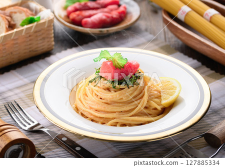Luxurious cod roe pasta and colorful mentaiko presentation - Japanese and Western cuisine, stylish lunch Luxurious cod roe pasta and colorful mentaiko presentation - Japanese and Western cuisine, stylish lunch 127885334