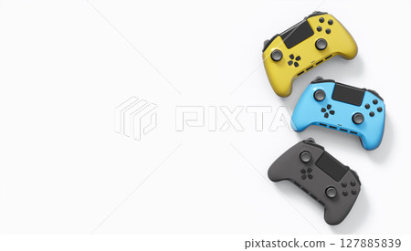 Realistic colorful video game joysticks or gamepads with color buttons on white 127885839