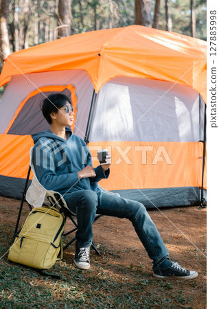 Business concept of cafe focuses on nurturing coffee in harmony with nature, organic seed create warm cup caffeine, background green fresh great outdoor. aromatic drink, rich aroma of rising from mug 127885998