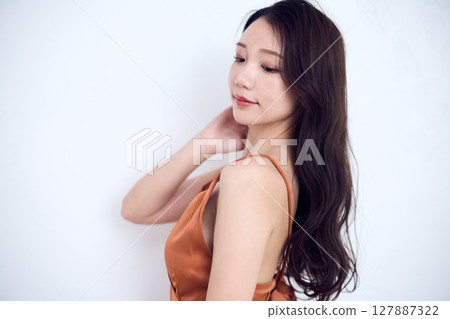 A portrait of a beautiful woman with a confident gaze 127887322