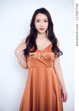 A portrait of a beautiful woman with a confident gaze A portrait of a beautiful woman with a confident gaze 127887348