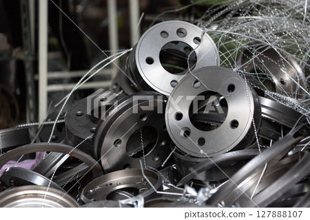 Checking car brake system for repair at car garage 127888107