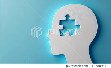 A white head silhouette with a missing puzzle piece, expressing the concept of mental health and the journey toward completeness 127889318