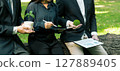 Businessman is analyzing about the environment and is concerned about global warming. 127889405