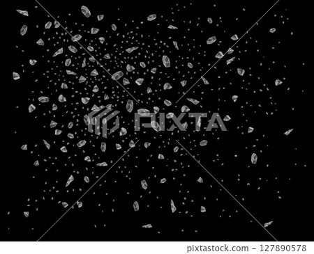 Salt crystals exploding on black background creating a beautiful pattern 127890578
