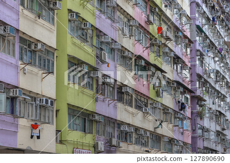 June 29 2025 Urban Apartment Exterior with Peeling Paint and Multiple Small Windows June 29 2025 Urban Apartment Exterior with Peeling Paint and Multiple Small Windows 127890690