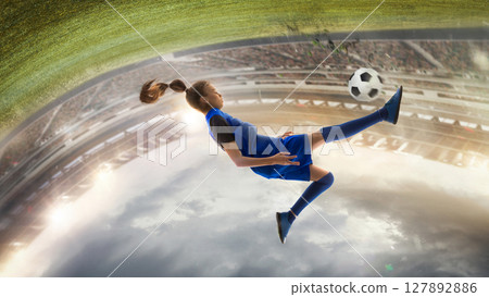 Girl defies gravity during soccer play on dramatic 3D football field. Dreams in sports Girl defies gravity during soccer play on dramatic 3D football field. Dreams in sports 127892886