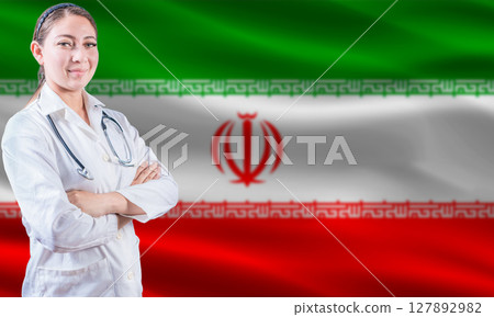 Female doctor on Iran flag. Doctor with crossed arms on Iran flag. Iran health and care concept Female doctor on Iran flag. Doctor with crossed arms on Iran flag. Iran health and care concept 127892982