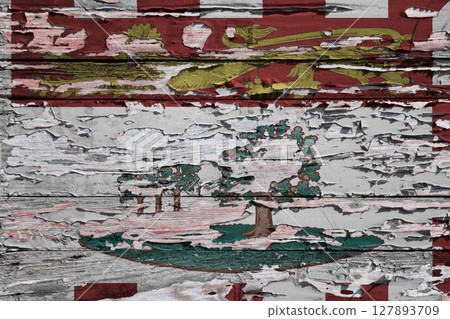 Flag of Prince Edward Island painted on a wooden board 127893709