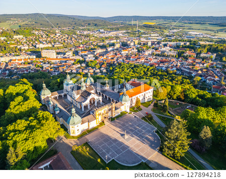 The Baroque complex of Holy Mountain in Pribram stands majestically amidst lush greenery, welcoming pilgrims and visitors. 127894218