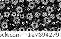 Black and white seamless floral pattern with hand-drawn flowers and leaves. Ideal for fabric prints, wallpapers, gift wrap, stationery, textile, and spring or summer-themed designs. 127894279