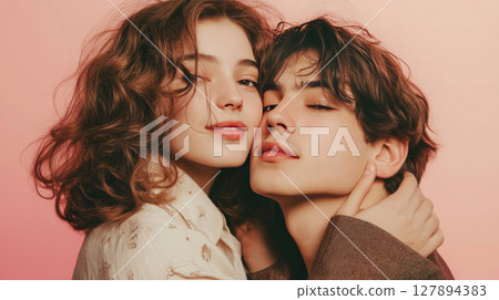 Affectionate Young Couple Embracing with Soft Expressions Affectionate Young Couple Embracing with Soft Expressions 127894383