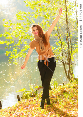 Young girl in forest Young girl in forest 127895766