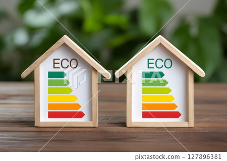 Eco friendly homes showing energy efficiency rating with colorful chart 127896381