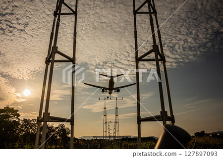 Airplane at dusk Airplane at dusk 127897093