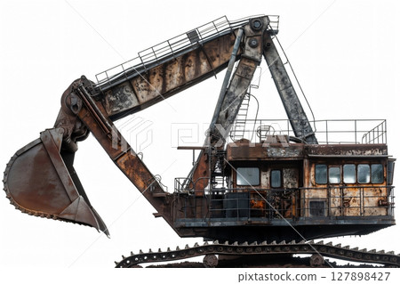 Old, rusty excavator with a giant bucket on a white background, showcasing its history and industry Old, rusty excavator with a giant bucket on a white background, showcasing its history and industry 127898427