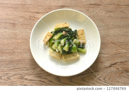 stir fried Chinese cabbage with slice tofu and chop pork in soy sauce on plate stir fried Chinese cabbage with slice tofu and chop pork in soy sauce on plate 127898769