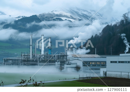 Petrochemical plant releasing smoke and steam in a mountainous landscape, highlighting the impact of industry on the environment Petrochemical plant releasing smoke and steam in a mountainous landscape, highlighting the impact of industry on the environment 127900111