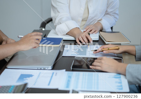 Business meeting account managers crew working search page on computer with new startup project. Idea presentation, analyze plans. 127900236