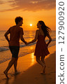 Men and women running in the sunset sea 127900920