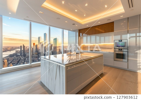 Stylish minimalist kitchen featuring an island and stunning city view 127903612