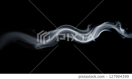 smoke overlay on black background. Long smooth horizontal smoke trail with airy flowing motion on dark background for overlay or design element smoke overlay on black background. Long smooth horizontal smoke trail with airy flowing motion on dark background for overlay or design element 127904399