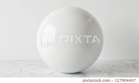 Large white ball sculpture standing on marble floor, modern minimalist object for interior design or art installation concepts 127904407