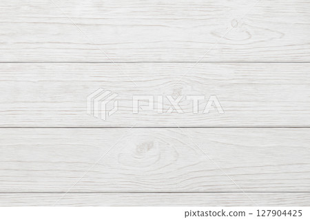 White wood texture background with prominent natural grain and knots, clean wooden plank surface perfect for interior design or flooring 127904425