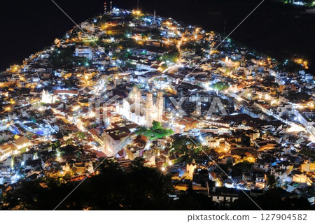 Night view of the city of Taxco, a tourist destination in Central America, Mexico Night view of the city of Taxco, a tourist destination in Central America, Mexico 127904582