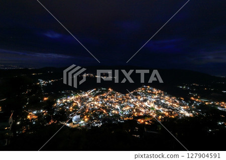 Night view of the city of Taxco, a tourist destination in Central America, Mexico Night view of the city of Taxco, a tourist destination in Central America, Mexico 127904591