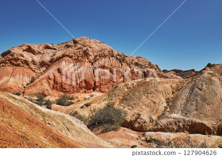 Red canyon and clear blue sky, natural landscape. Red canyon and clear blue sky, natural landscape. 127904626