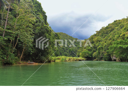Lake among green hills. Mangrove forest in Philippine Bohol island Lake among green hills. Mangrove forest in Philippine Bohol island 127906664